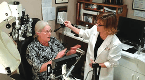Vision Specialists of Michigan in "Women in Optometry" Dr. Collins with patient