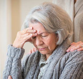 Woman suffering from headache.