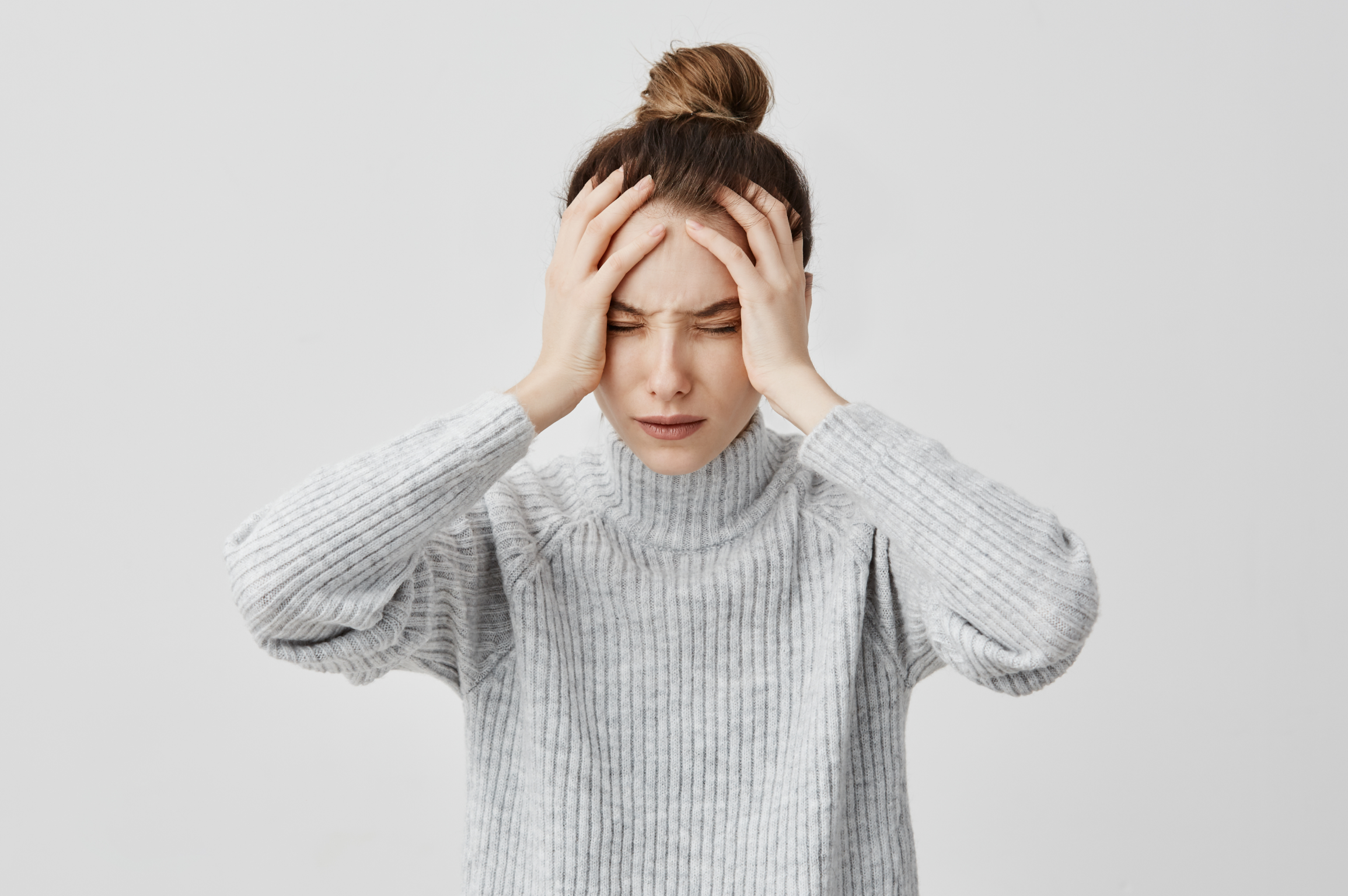 Woman suffering from a headache BVD